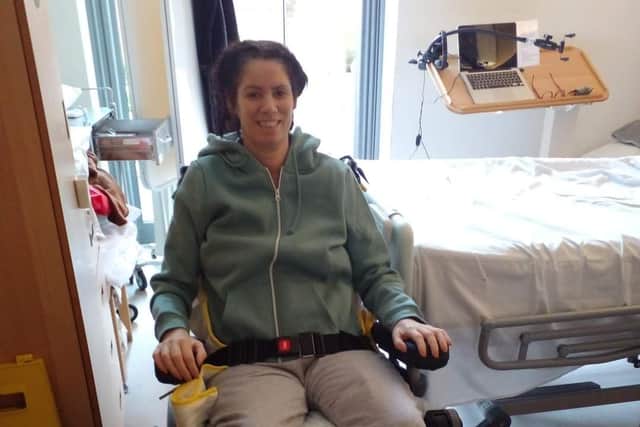 Jill Dodds in a wheelchair at the James Cook University Hospital in Middlesbrough.
