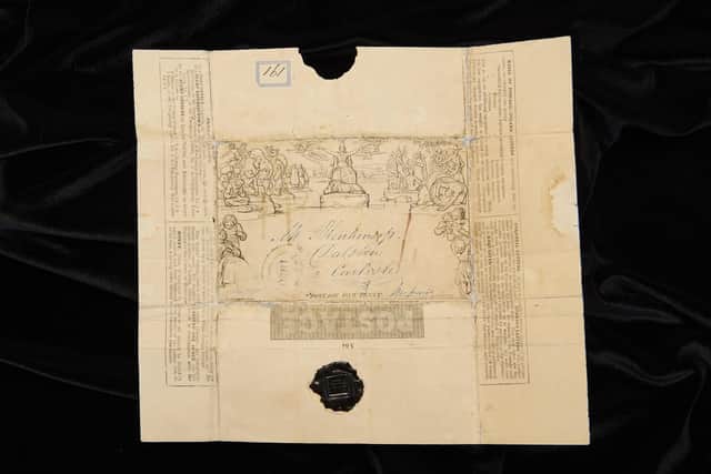 The wrapper was a Mulready envelope, another form of prepaid postage bearing an intricate design. (Photo by Sotheby's)