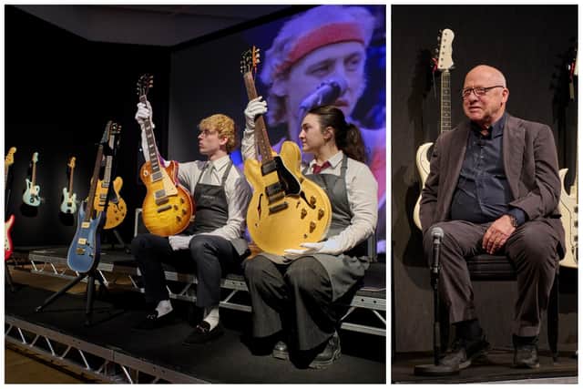 Mark Knopfler (right) spoke at an exhibition of the instruments ahead of the auction. (Photo by Christie's Images)