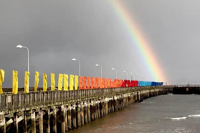 The Amble jetty was set to be lit up with a wide array of vibrant colours and lights.