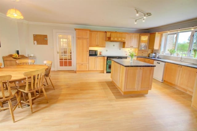 The kitchen is equipped with plenty of wall and base units and benefits from the addition of a superb pantry.