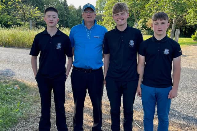 Sandy Twynholm with Alan Young, Daniel Hourigan and Ethan Hourigan. Picture: Morpeth Golf Club