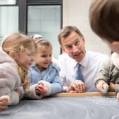 Chancellor Jeremy Hunt expanded free childcare across England in the spring budget. (Photo by Stefan Rousseau/WPA Pool via Getty Images)