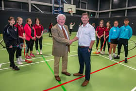 Coun Jeff Watson with Active Northumberland sports centre manager Andy Evans, Active Northumberland staff and a group from Berwick Academy. Picture by Jim Gibson.