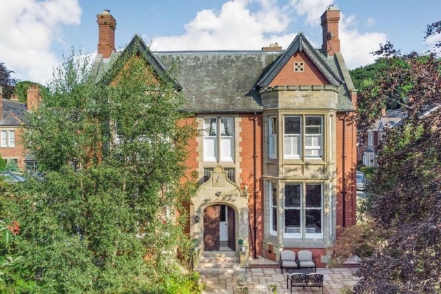 With red-brick elevations and appealing symmetry to its frontage, Number 7 De Merley Road showcases bay windows with stone castellated tops and an impressive entrance portal.