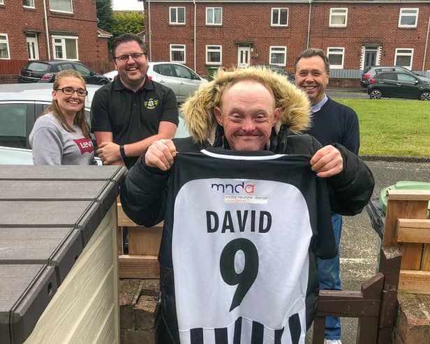 David Bainbridge with his personalised football shirt and Nicola Shotton, Brian Shotton and Ian Reid.