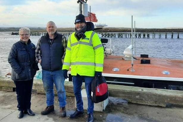 Karen Gibson, Health Inequalities Lead Coordinator for Well Up North Primary Care Network with Brian Douglas, skipper of Amble fishing vessel Sarah Louise and Peter Dade, Mission Area Officer North Shields. Fishermen’s Mission.