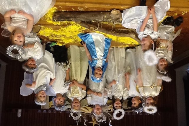 Mary and a cast of angels from St Paul's Pre-School, Alnwick.