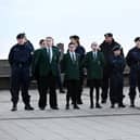 The academy’s sea cadets joined the service in their uniforms. (Photo by Barry Pells)