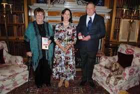 Margaret Mitford and Jon Gray were awarded their honours by the Duchess of Northumberland.