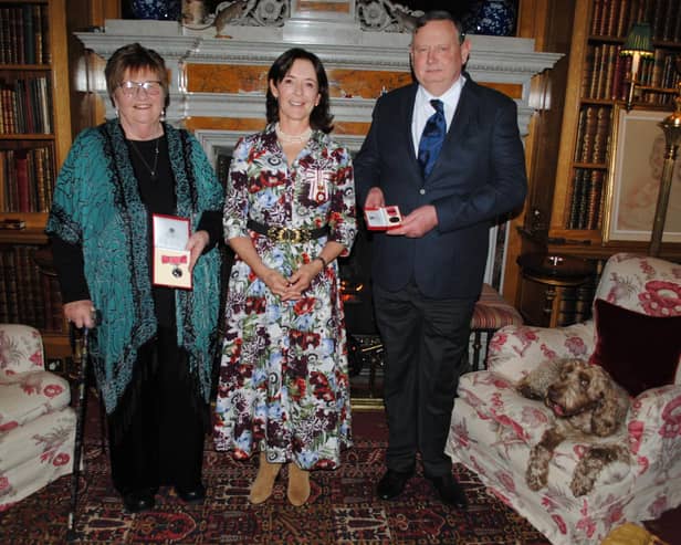 Margaret Mitford and Jon Gray were awarded their honours by the Duchess of Northumberland.