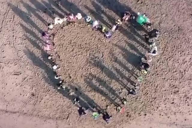 A beach heart to celebrate the Ofsted success.