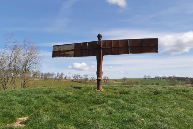 A mini version of the Angel of the North standing in a field near Hexham.