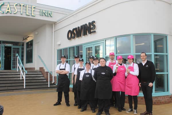 The staff of Cones and Oswin's outside the fish and chip shop. (Photo by The Inn Collection Group)