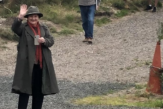 Brenda Blethyn, who stars as Vera, waves as Kelly Mallaburn, who works at the Seaview Restaurant at The Fishing Boat Inn, Boulmer, takes her picture.