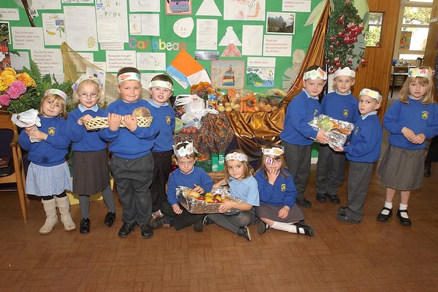 Pupils from Hipsburn First School taking part in a Harvest Festival in October 2004.