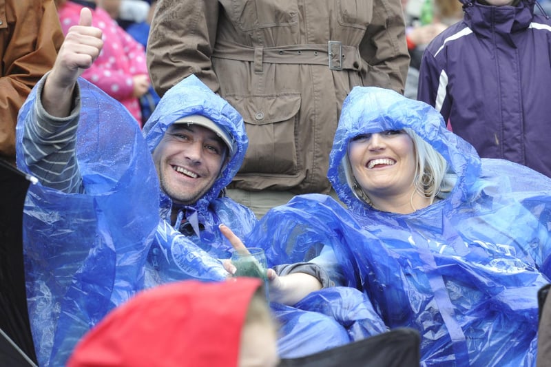 Getting into the swing of things despite the damp conditions at Jessie J's concert in the Pastures beneath Alnwick Castle on Saturday, August 25, 2012.