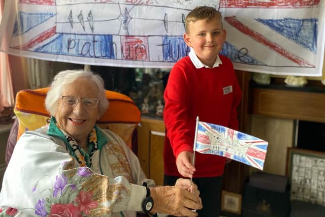 Flag designer Olly Sim with Betty Brown.