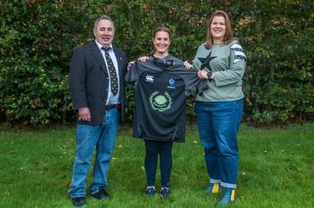 Juklie Riley of the Lime Shoe Company sponsors Berwick Ladies rugby team.