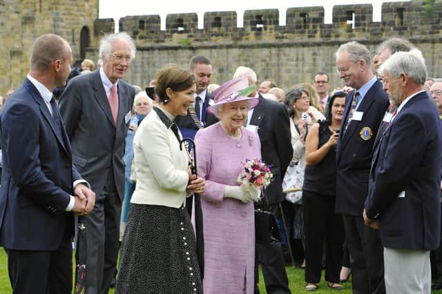The Queen pictured by Jane Coltman meeting community groups during her visit to Alnwick in 2011.