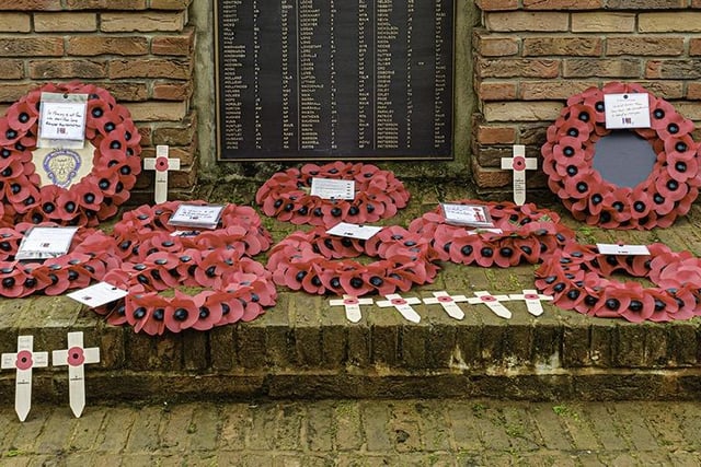 A selection of wreaths and poppy crosses laid at Ashington war memorial yesterday.
