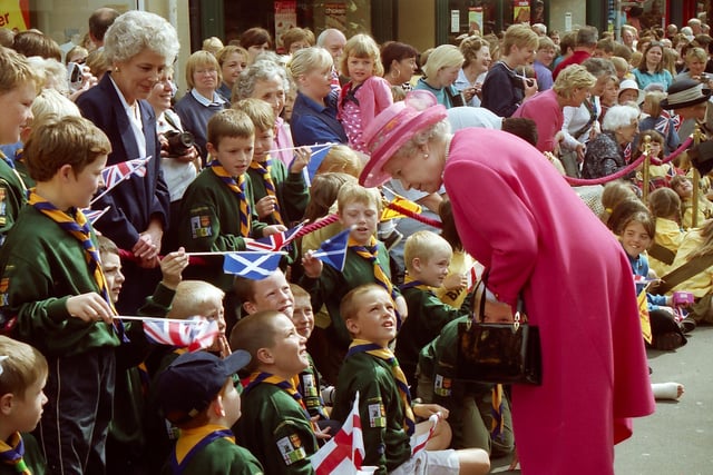 The Queen chats to cub scouts on Marygate in Berwick in 2001.