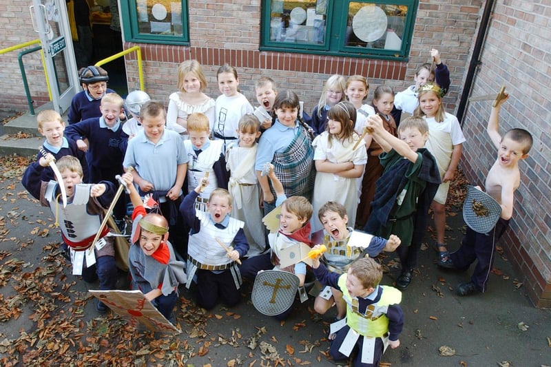 Tritlington First School all dressed up and ready to go to the Museum of Antiquities, Newcastle, in October 2003.