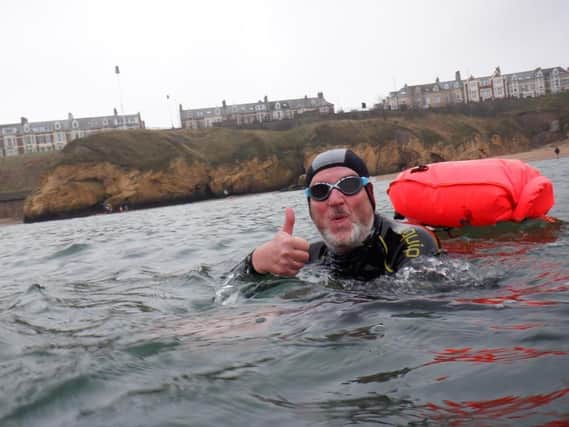 Alan Holmes during his North Sea swimming challenge.