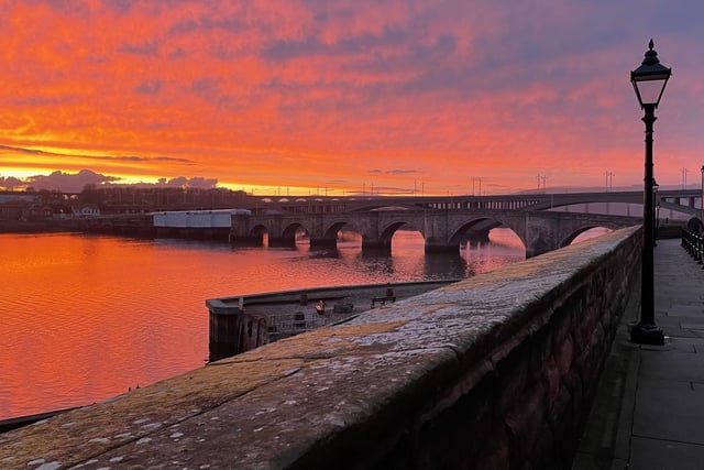 A sunset view of Berwick Old Bridge and the River Tweed by Ailsa Hankinson.