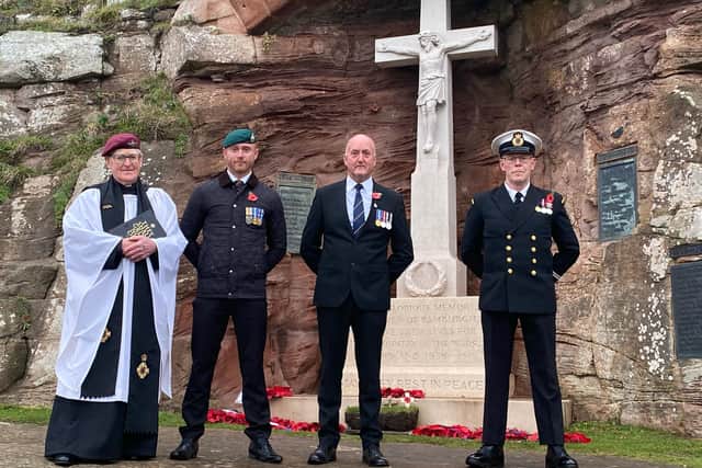 From left: Reverend John Evans, Paul Tait, Alec Tait and Ian Thompson paying their respects at Bamburgh War Memorial