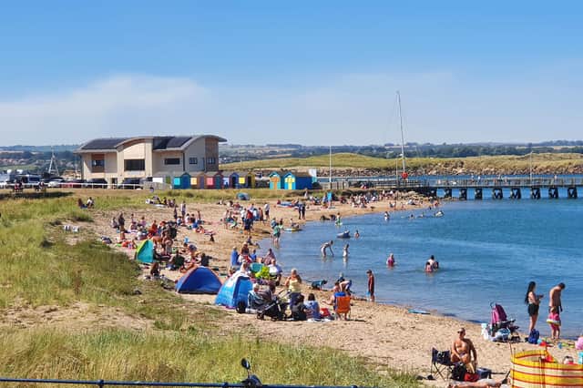 Residents and tourists alike filled the sandy shores of Amble's Little Shore beach.