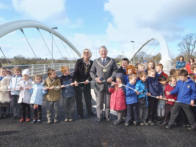 OPENING OF LESBURY BRIDGE BY COUNCILLOR JOHN MORRIS AND CHILDREN FROM HIPSBURN FIRST SCHOOL.