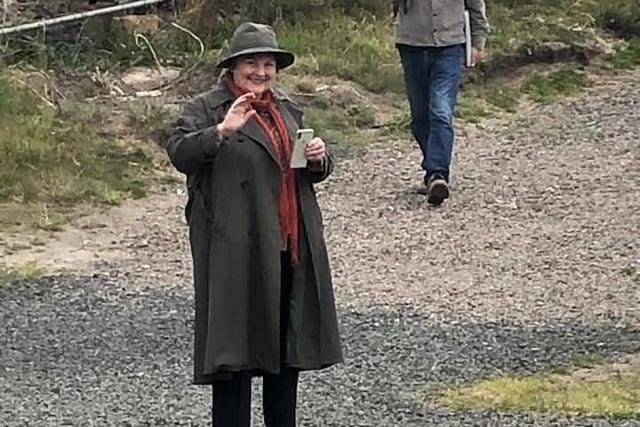 Brenda Blethyn, who stars in ITV crime drama Vera, waves as Kelly Mallaburn, who works at the Seaview Restaurant at The Fishing Boat Inn, Boulmer, takes her picture.