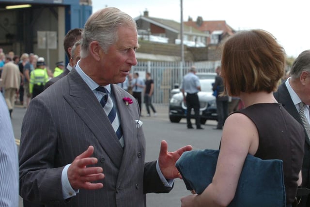 HRH Prince Charles talks to Northumbrian piper Kathryn Tickell during a visit to Seahouses.
