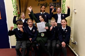 Executive headteacher Louise Hall celebrates the reports with pupils from Bothal Primary School.