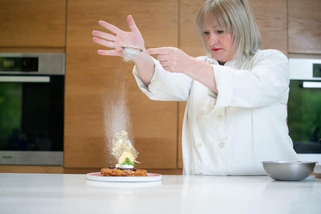 Mary Wilkins at work in the kitchen. Picture: Sean Elliott Photography