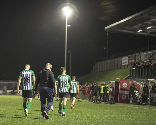 The Spartans players leave the pitch after their stoppage time defeat away at Scarborough. Picture: Paul Scott/Blyth Spartans