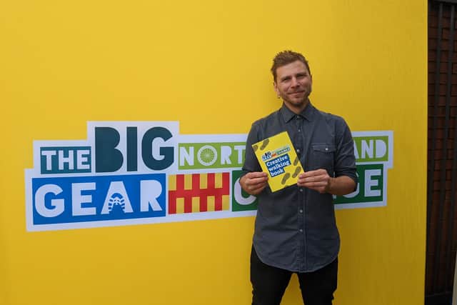 Edward Clark, Senior Programme Transport Officer at Northumberland County Council with the Big Northumberland Gear Change’s new Creative Walking Book (Photo by Kaleidoscope CFA).