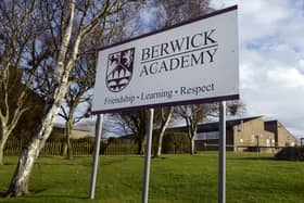Berwick Academy said it is "disappointed" by an employment tribunal's verdict that it unfairly dismissed teacher Ged Thomas.