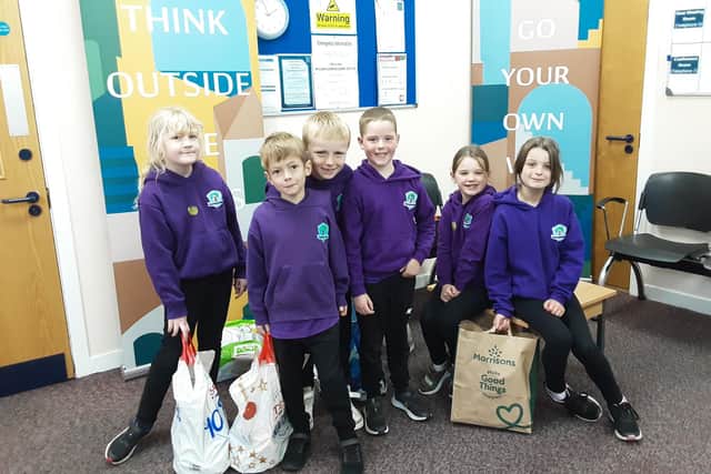 Scremerston First School pupils at the food bank run by Berwick Community Trust.