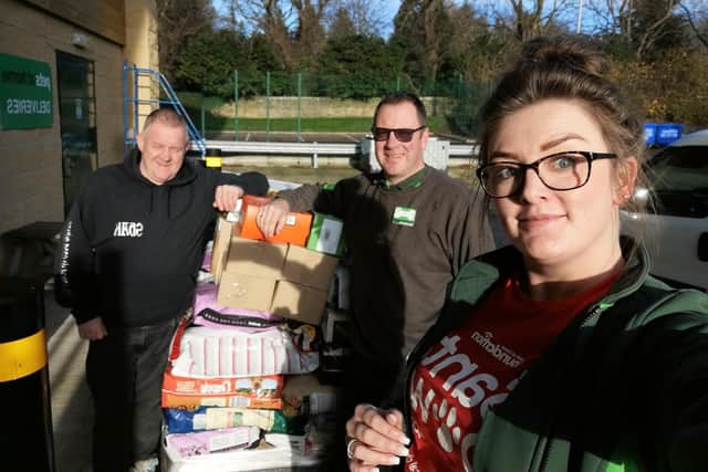 Staff from the Alnwick branch of Pets at Home with the donations for SHAK.