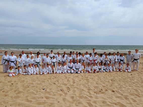 Karate students and instructors at the Karate on the Beach event. Picture: Kokoro Shotokan Karate Club
