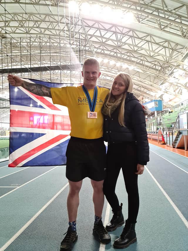 Connor Cowens, with his partner Louise Swordy, celebrating third place in the world championship.