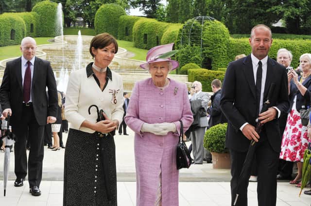 The Queen with the Duchess of Northumberland and Alan Shearer on a visit to Alnwick in 2011.