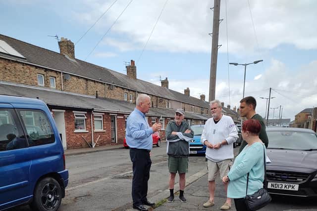 Wansbeck MP Ian Lavery (left) visited the street to discuss residents' concerns. (Photo by Sue Floyd)