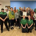 HM Lord Lieutenant Dr. Caroline Pryer celebrates with volunteers from SJA and LSCC.