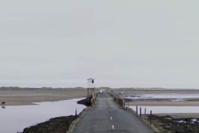 The incident happened on the Causeway to Holy Island, after concerns were raised a man was going to be cut off by the tide. Image copyright Google.