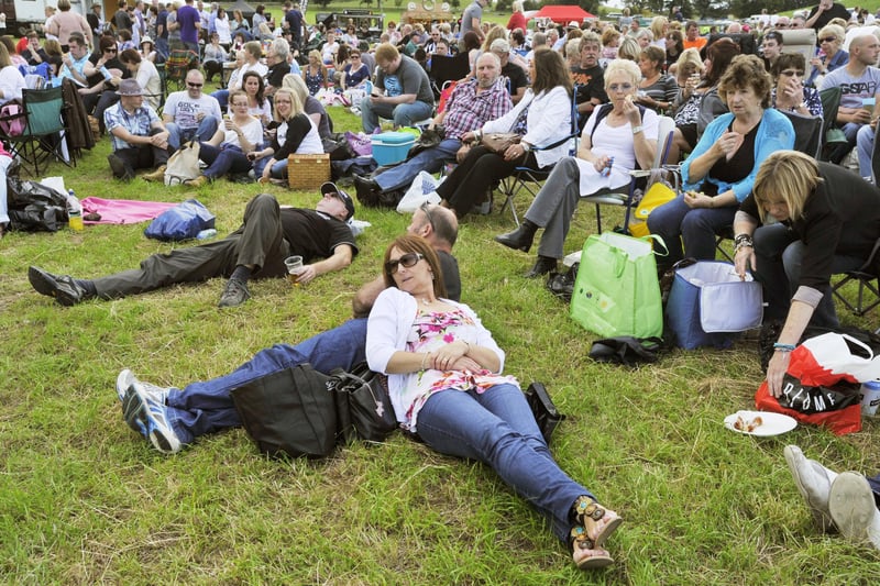 ... and eating picnics ahead of the Status Quo, 10cc and Big Figure concert in the Pastures, Alnwick, in 2011.