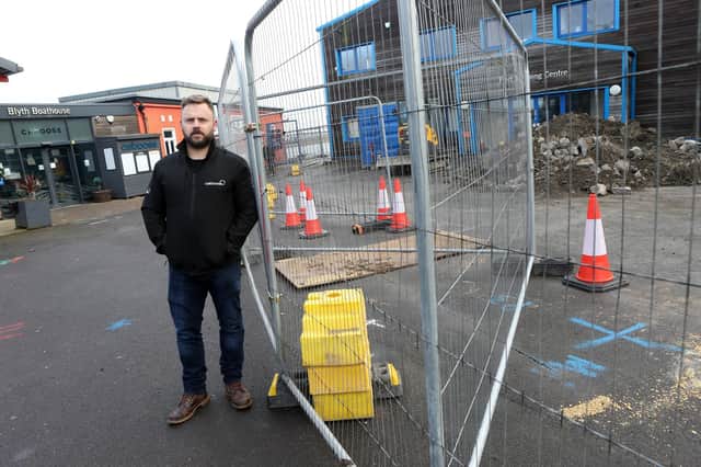 Marc McPake beside the construction work in his restaurant car park, which he says forced him to close his business.