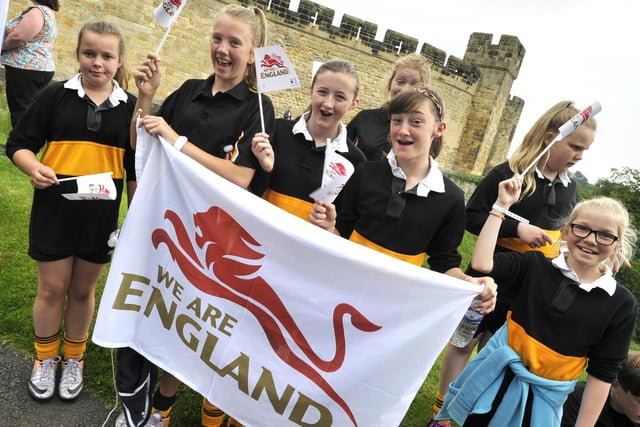 Tweedmouth Middle School pupils fly the flag.